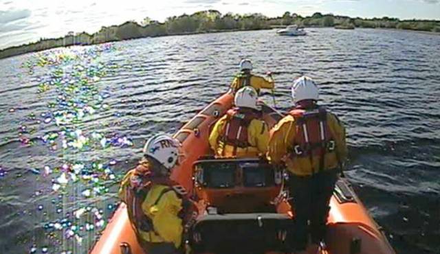 The volunteer crew of the Lough Derg lifeboat on route to the motor boat