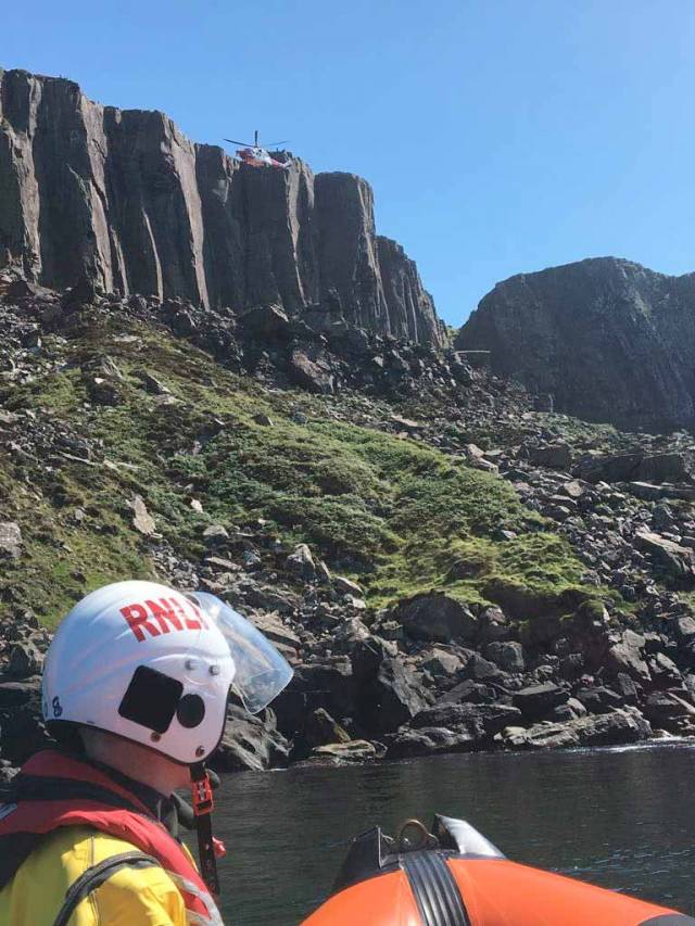 Red Bay’s inshore lifeboat attending the scene at Fair Head on the North Antrim coast