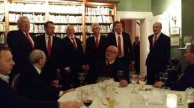 Doyen of the Dublin Judges and George Chapman, Honorary Dublin Judge, serenaded by a barbershop sextet at the 2015 Judges Dinner in RStGyC