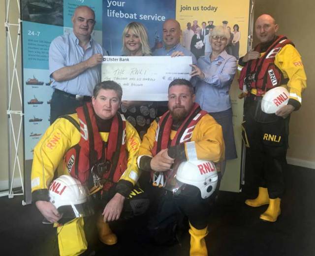 Deirdre King, Marketing Manager, Pavilions Shopping Centre and Ian Hunter, Centre Director, Pavilions Shopping Centre in Swords, County Dublin presenting the RNLI with a cheque for €10,600. Representing the RNLI from Left to Right are Conor Walsh Divisional Maintenance Manager, Jan Doyle, Chairperson of Skerries RNLI Fundraising Branch, Skerries RNLI crewmember Steven Campion standing, and Skerries crewmembers Stephen Johnson and Paddy Dillon kneeling