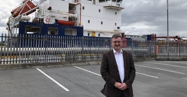 Port of Galway CEO Conor O'Dowd in front of a regular visitor to the city's Docks, the Corrib Fisher. AFLOAT adds the James Fisher Everard tanker operates from Whitegate Oil Refinery, Cork Harbour which was previously served by Galway Fisher. 