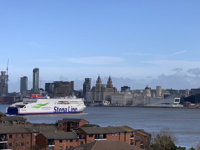 The newest ferry on the Irish Sea AFLOAT adds is the Stena Edda which recently made its maiden voyage from Birkenhead on the Wirral (as above) to Belfast. The E-Flexer class ferry faces opposite of Liverpool, when swinging off the newly upgraded Twelve Quays Ferry Terminal on Merseyside. Afloat also adds on the right is the Museum of Liverpool.