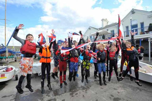 The Juniors of the National Yacht Club celebrate Annalise Murphy’s Olympic achievements. When the Junior Training programe at the National YC was inaugurated 50 years ago, the extensive boat platform on which this is all happening didn’t exist