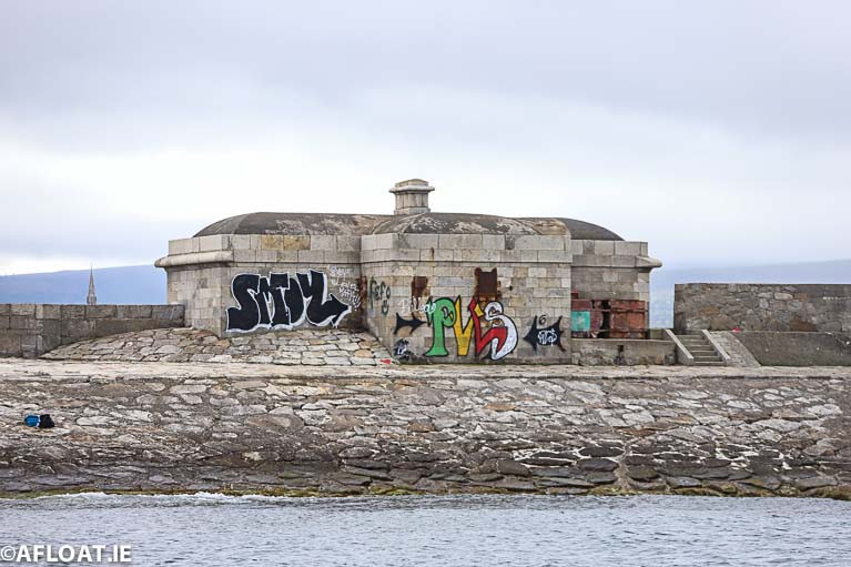 First sight of Dun Laoghaire from the sea: A shoreward view of vacant buildings are blighted by graffitii on Dun Laoghaire&#039;s West Pier. The council says graffiti poses a significant problem throughout the Dun Laoghaire area