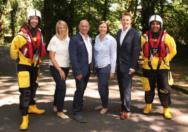 Kinsale RNLI’s Dave Humphreys and Temba Jere flank organising committee members Avril O’Brien and David Doherty (second from right), MC Alan Shortt and RNLI Munster community fundraising manager Mary Creedon