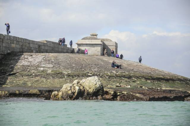 A large piece of stonework has been dislodged from the roundhead apron at Dun Laoghaire's West Pier