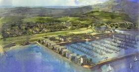 Holyhead marina in north Wales, with project images for the waterfront development planned by Conygar Stena Line at Newry Beach