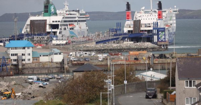 Some freight services continue between Wales and Ireland AFLOAT adds on the core Irish Sea short route service between Holyhead and Dublin Port. Above at the north Wales port berthed at Salt Island is Ulysses of Irish Ferries and Stena Adventurer operated by Stena Line