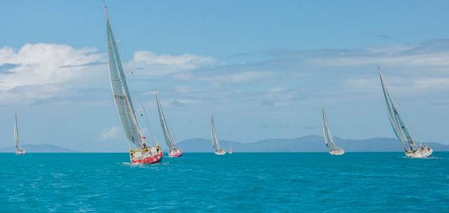 The Clipper Race fleet departing the Whitsundays earlier today