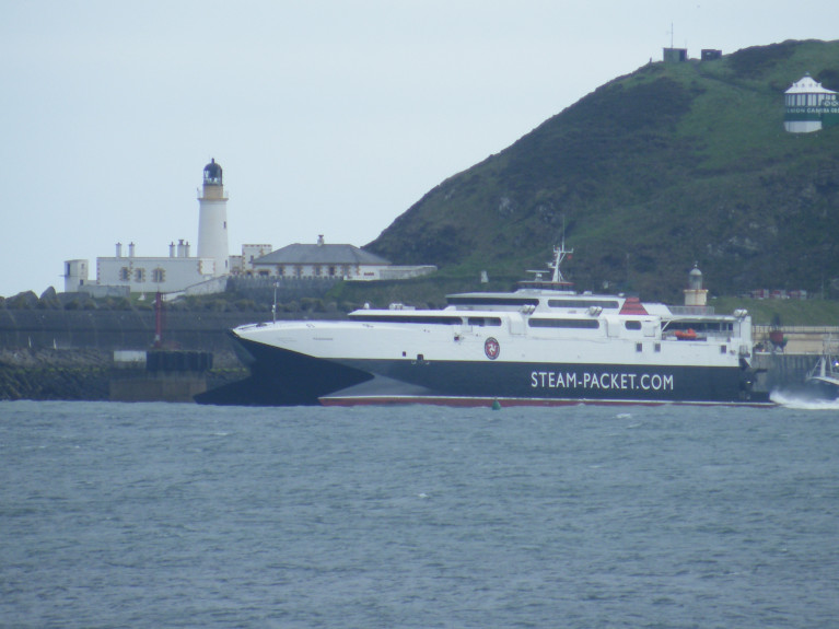 Isle of Man serving fastcraft ferry Manannan departing Douglas Harbour, however this year's 'season' services by the craft have been delayed due to Covid 19's impact leading to the continued closure of Manx borders. 