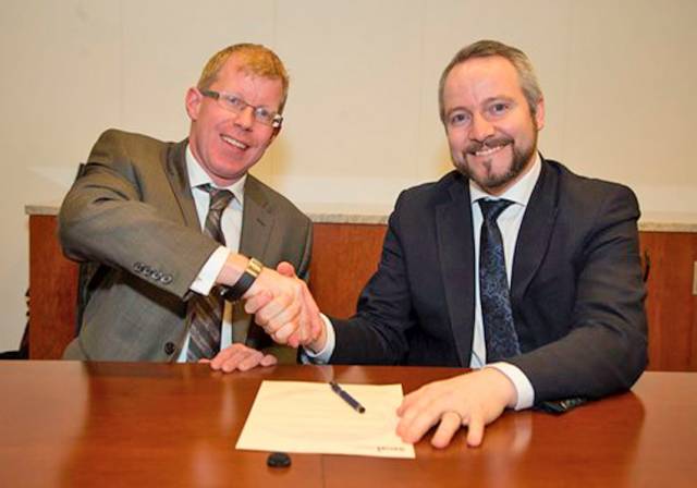 Inland Fisheries Ireland CEO Dr Ciaran Byrne and SEAI chief executive Jim Gannon confirm their partnership on energy savings