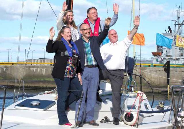 Noel Grealish, Independent TD for Galway West with event Chairperson Martin Breen and members of the ICRA/WIORA organising committee on board J109 Joie De Vie, Galway's Class One challenger in this year’s ICRA National Championships