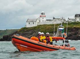 Crosshaven RNLI (above) rescued sailors from upturned boat