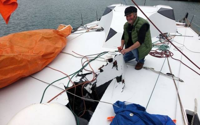 Yachtsman Enda O'Coineen with the damage to his yacht, the Kilcullen Voyager