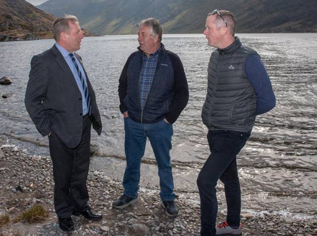 Michael Creed TD, Minister for Agriculture Food and the Marine (left) talks to pilot farmers Padraig Connell, from Waterville and Colm Gavin from Leenane at the launch of the Pearl Mussel EIP Scheme at Glenbeg Lake, Ardgroom on the Bears Peninsula