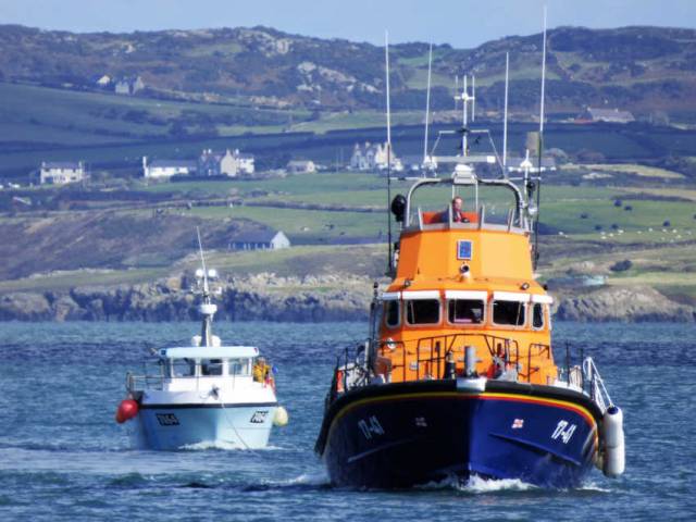 Holyhead’s all-weather lifeboat Christopher Pearce returning to shore with the stricken Irish vessel