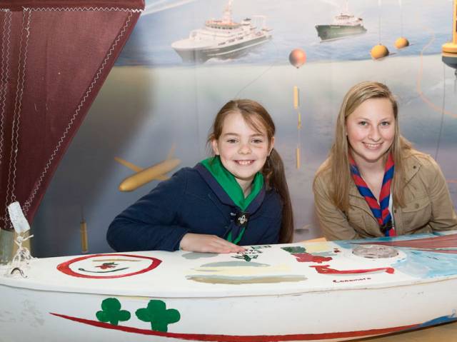 Méabh Ní Ghionnáin and Kaitlyn Dow with the unmanned sailboat that brought them together