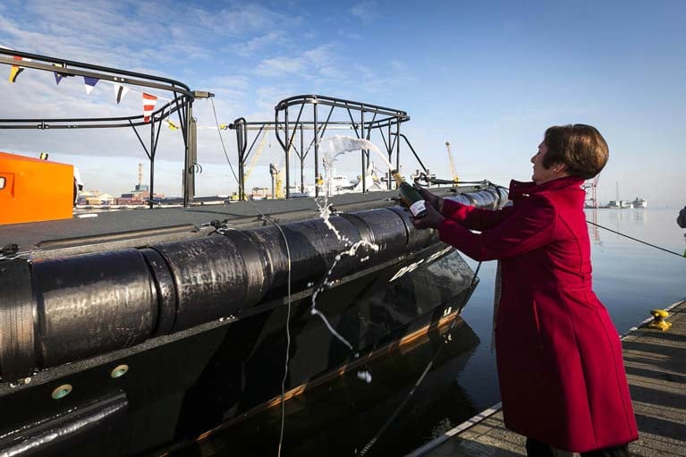 Poolbeg Vice Commodore Eileen Murray carried out the traditional smashing of a champagne bottle on the bow of the Tolka