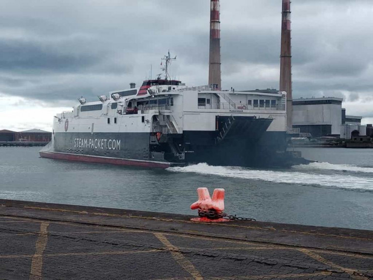 Catamaran fastcraft ferry Manannan built by InCat, underway off the quayside of Dublin Port's main ferry terminal following opening of the seasonal route to Douglas. The service normally resumes in March but was delayed due to Covid-19 travel restrictions.  