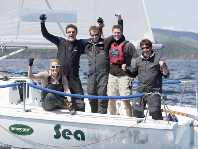 Dara O’Malley (second left) and his crew in on their Hunter 707 Seaword after yesterday’s overall victory in the Silvers Marine Scottish Series at Tarbert