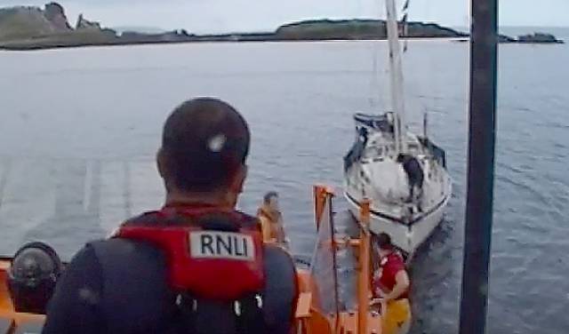 Howth RNLI All weather lifeboat tows the yacht. See video below.