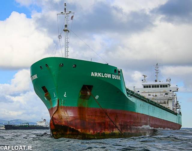 At close quarters: Gone is the grey hull colour of former owner's Flinter Group whose cargsoship is now Arklow Dusk. The Irish flagged ship had made its first call to Dublin Port and was one of seven ships that presented a busy scene in Dublin Bay over the May Bank Holiday weekend. 