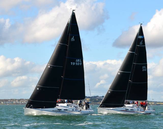 A perfect sailing day – the J/109 Outrajeous (Richard Colwell & Johnny Murphy) showing ahead of National Championship runner-up Storm (Pat Kelly) early in Saturday’s racing at Howth, but overall Storm now holds the lead