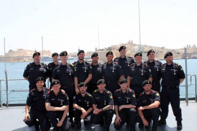 Crew members of L.É. Samuel Beckett (which docked in Valletta, Malta) with their 'Operation Sophia' medals presented in recognition of their role in disrupting human-trafficking and smuggling in the central Mediterranean
