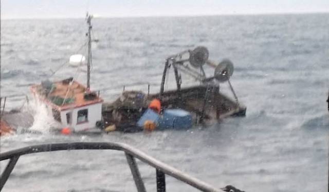 Castletownbere RNLI have rescued two fishermen from this sinking boat on the Beara peninsula
