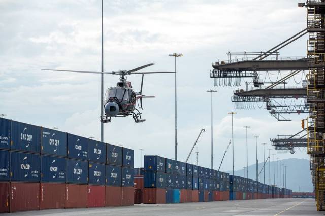 The Next Bond Movie where above a helicopter films one of the action sequences at the container terminal in Kingstown, Jamaica which involved Eon Productions in partnership with French container giant CMA CGM. AFLOAT adds the operator's Irish division, CMA CGM Shipping (Ireland) Ltd has offices located in Dublin and Cork from where 'feeder' vessels serve these ports connecting to Europe and beyond.