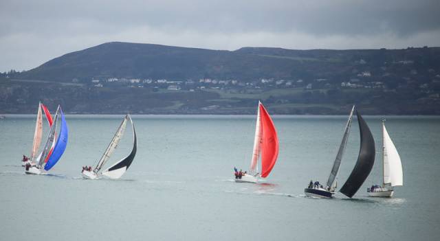 Dear Prudence (black spinnaker) Barry Lyons & John Given of the RIYC leads ICRA Boat of the Year Joker II skippered by John Maybury (red spinnaker). Joker II is ahead of Royal Irish club mates Beneteau 34.7 Black Velvet (3471) Leslie Parnell and J109 sisterships Indecision (Declan Hayes, Ronan Moloney, & Patrick Halpenny) and Jump the Gun (John M. Kelly & Michael Monaghan) into a Scotsman’s Bay mark in Sunday’s DBSC Spring Chicken Series race
