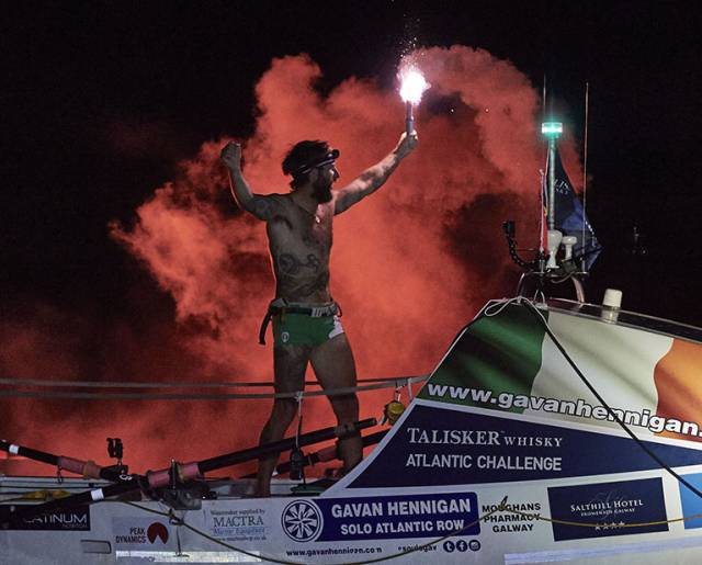 Gavan Hennigan celebrates his arrival in Antigua after setting a new Irish solo Atlantic rowing record 