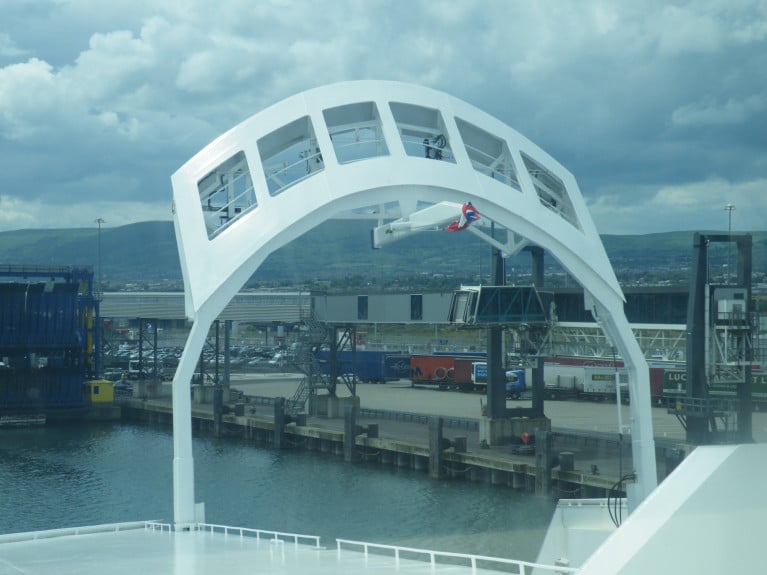 Britain-NI trade: The 'goods at risk' issue has proven highly sensitive in talks between the EU and the UK. Above AFLOAT adds in the raised position is the upper bow 'gate' visor of a ferry while in Belfast Harbour where freight-trailers can be seen on the quayside. 