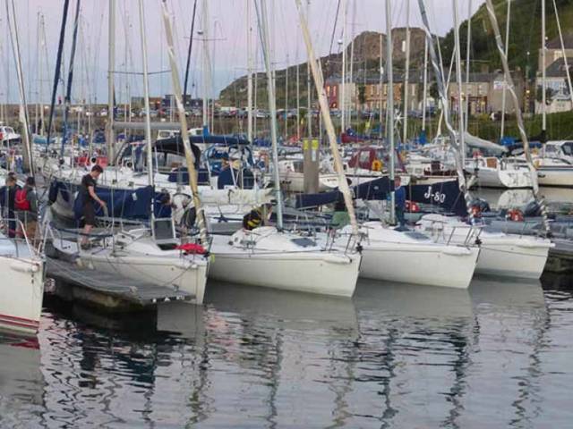 The workhorses in waiting……Howth Yacht Club’s flotilla of J/80s which fulfill half a dozen roles at various levels of training each week