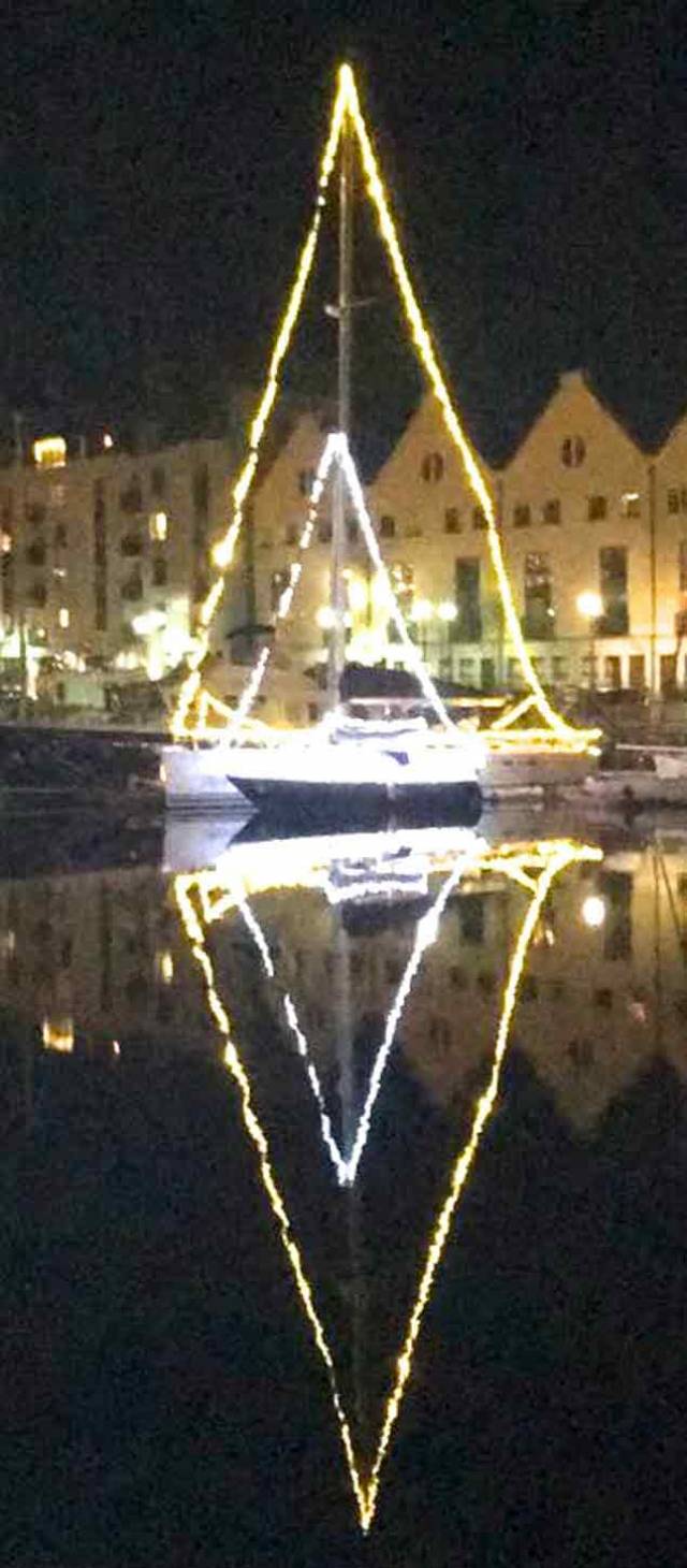 Don’t they know it’s Christmas? The west coast may have had some serious storm batterings recently, but Christmas calms - the Halcyon days – have descended on Galway Harbour this week. Yet some reports suggest that not everyone is delighted with the brightly festive boats in the city-centre marina