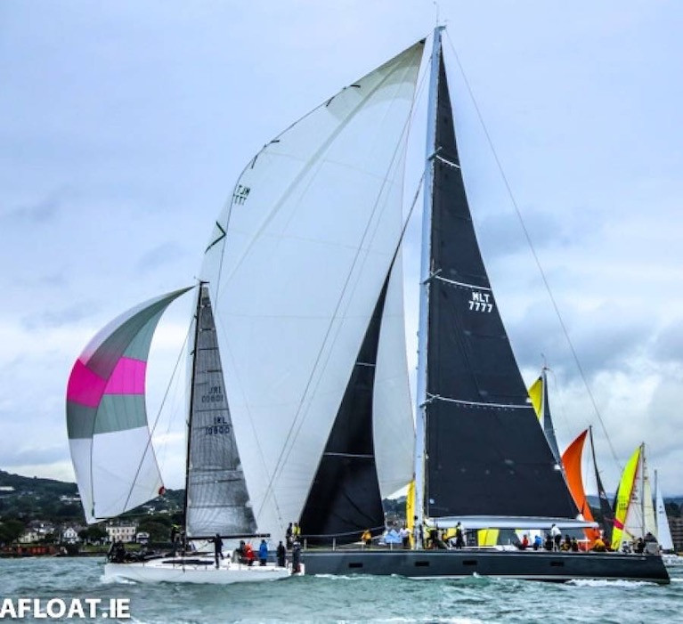 The National YC's biennial Volvo Dun Laoghaire to Dingle Race, currently scheduled for June 9th 2021, could become symbolic of the emergence from pandemic. The start of 2019's race shows overall winner Paul O'Higgin's JPK 10.80 Rockabill VI (left) showing briefly ahead of Mick Cotter's 94ft line honours winner and new course record-setter Windfall