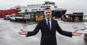Scottish Economy Secretary, Derek Mackay, at the now newly nationalised Ferguson Marine shipyard located at Port Glasgow on the Clyde. AFLOAT adds in the background is MV Glen Sannox, the first of a pair of CalMac ferries which have incurred a huge over-run on a contract with Caledonian Maritime Assets Ltd (CMAL) ferries.