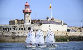 Optimist dinghy competitors return to Dun Laoghaire Harbour after today&#039;s Leinster Championship conclusion at the Royal St. George YC