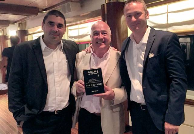 MGM Boats John O'Kane (centre) with the 'Dealer of the Year' award and Jeanneau executives (left) Jean-Philippe Brun, European sales director and Jean-Paul Chapeleau, Jeanneau CEO at the dealer conference in Turkey