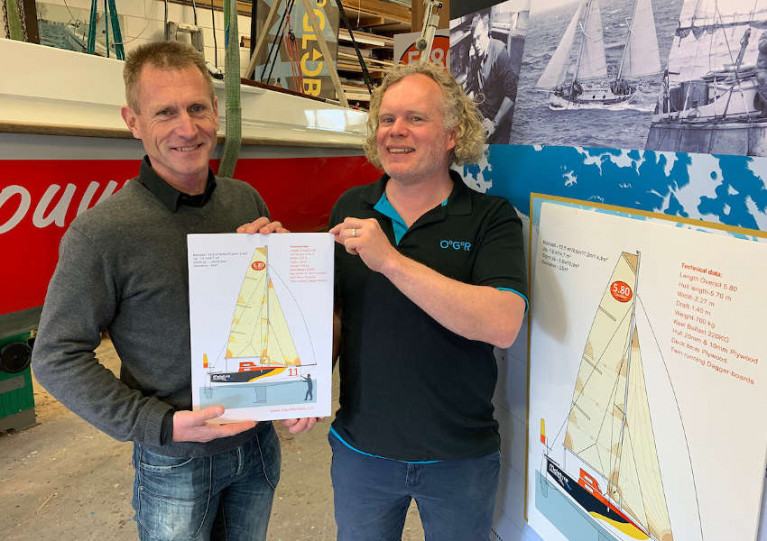 ClassMini 5.80 Association founding board member Eli Van der Broke hands over the licence of prototype Mini 5.80 number 02 to Michiel Pals at Kolibri Yachtbuilders in the Netherlands