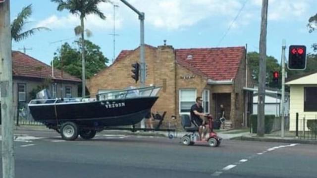 A photo of the man driving down the Pacific Highway on a motorised scooter was widely shared on social media.