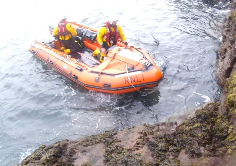 Larne RNLI’s inshore lifeboat Terry at the cliff near Muck Island