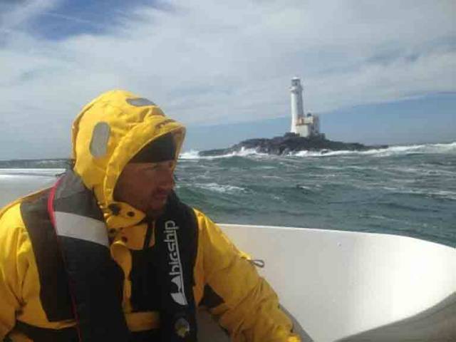 A competitor in the Class 40 Normandy Channel Race at the Fastnet Rock off the Cork coast