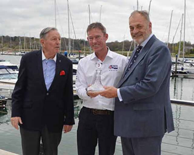Stephen 'Sparky' Park is presented with a boats.com/YJA Special Award for services to the sport of sailing at the Royal Southern Yacht Club Hamble this week. The award was presented by Barry Pickthall, Chairman of the Yachting Journalists' Association (right) and former Chairman Bob Fisher.