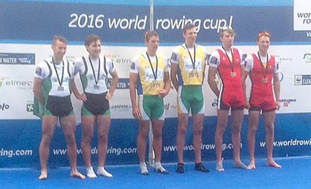 Gary and Paul O’Donovan on podium with their silver medals beside South Africa (gold) and Belgium (bronze). 