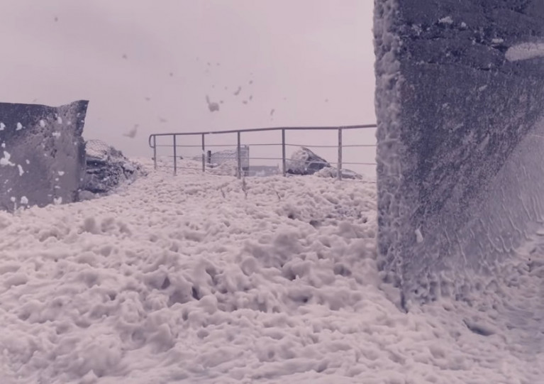 A still from video of the sea foam deluge in Bunmahon shot by a local furniture maker