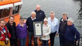 Pictured at the presentation are from left are Daniel O&#039;Connell, Aran Islands RNLI crew member, family member Sean Flaherty, John and Mary Harwood with the vellum, Tony Hiney, RNLI Community Fundraising Manager, John O&#039;Donnell Aran Islands RNLI Coxswain, John Mulkerrin Aran Islands RNLI mechanic and Michael Hernon, Aran Islands RNLI Lifeboat Operations Manager