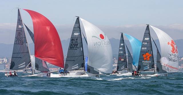 Royal St George YC's Chris Arrowsmith, David Cahill and Colin Galavan competing in yesterday's SB20 Worlds at Cascais