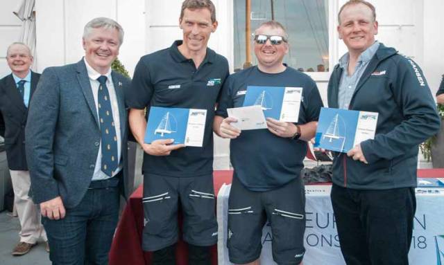 Royal Irish Yacht Club Commodore Joe Costello with SB20 Euro bronze medalists Ed Cook, Davy Taylor and Michael O'Connor