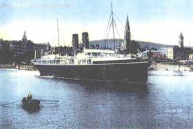 RMS Leinster moored in Kingstown (Dun Laoghaire) in between the East Pier and on the right of image the Carlisle Pier